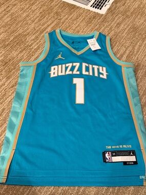 Jordan Buzz City Teal and Gold Basketball Jersey #1
